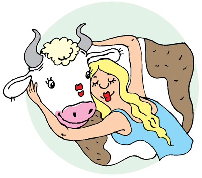 Девушка обнимает корову